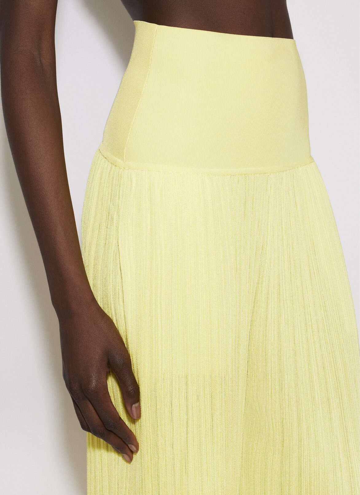 KNIT BAND PANTS IN PLEATED KNIT ALAÏA LIGHT YELLOW KNIT BAND PANTS IN PLEATED KNIT